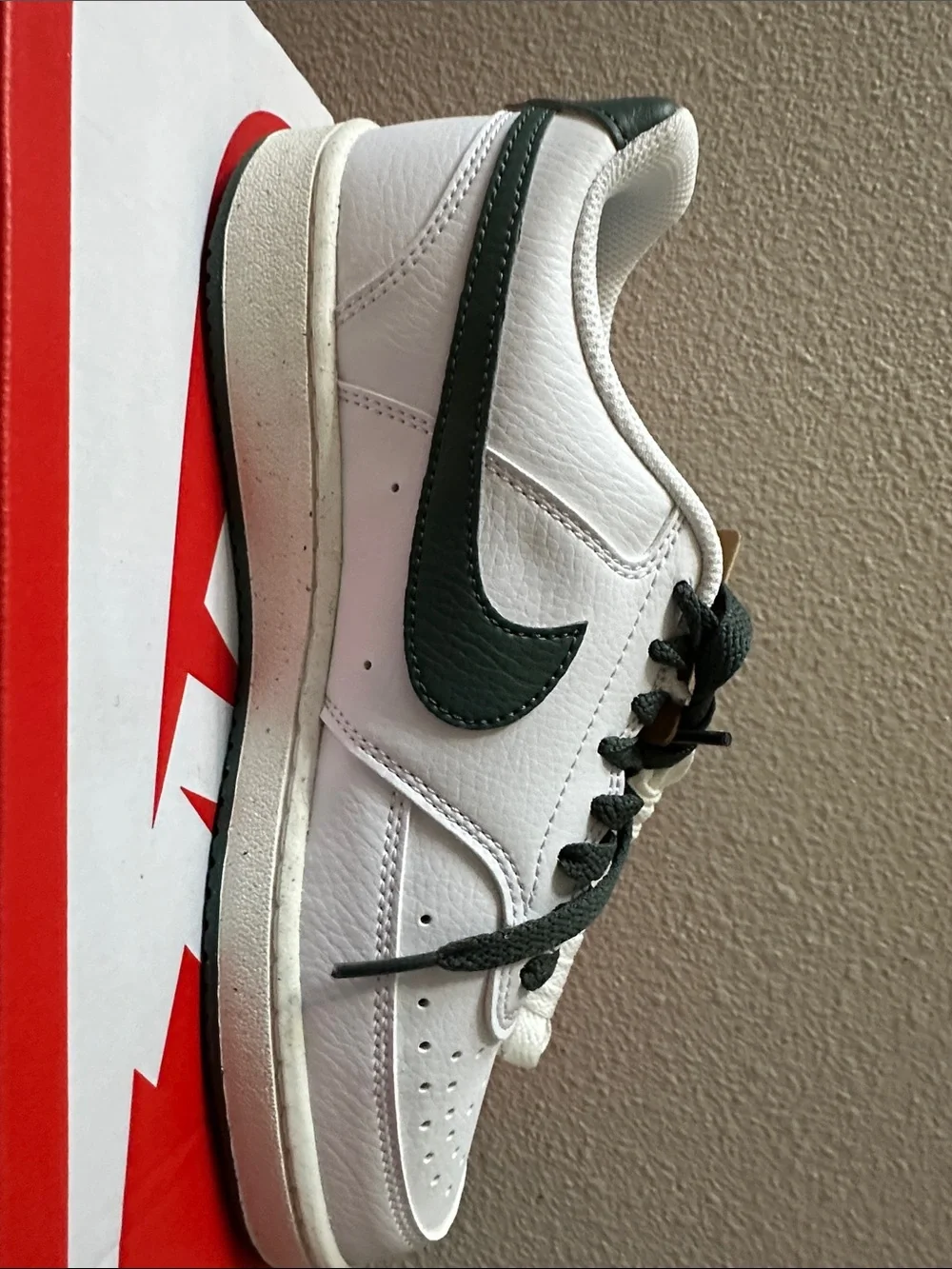 Nike White Low-Top Sneakers with Dark Green Swoosh and Heel